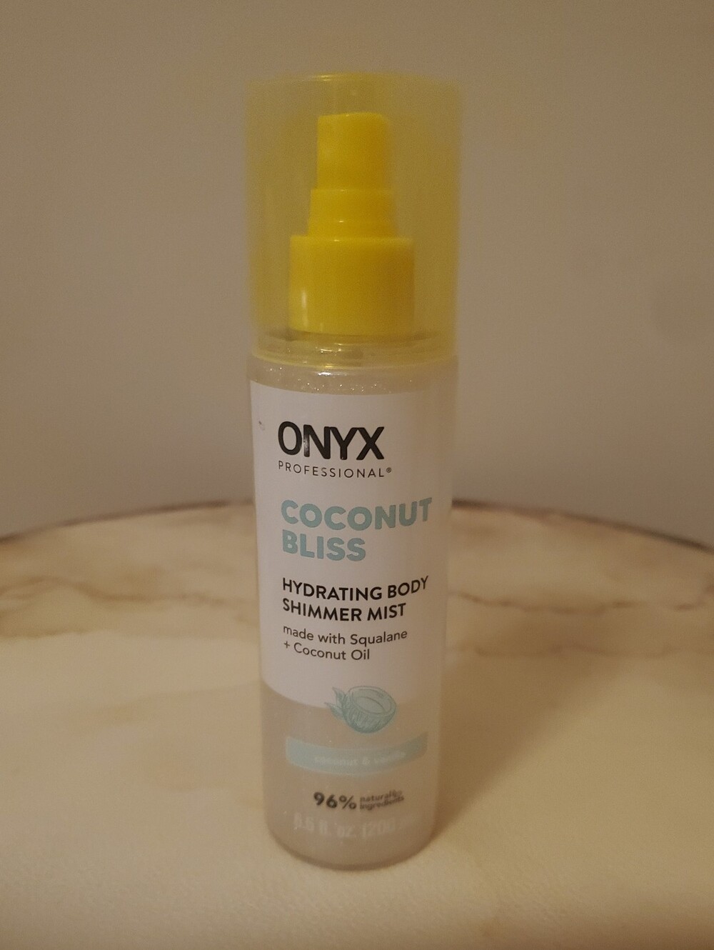 Onyx Coconut Bliss Hydrating Body Shimmer Mist — Yellow & White